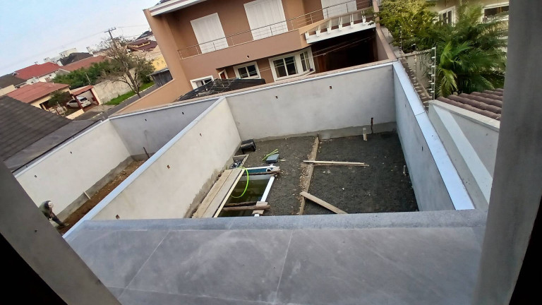 Imagem Sobrado com 3 Quartos à Venda, 200 m² em Marechal Rondon - Canoas Imagem Sobrado com 3 Quartos à Venda, 200 m² em Marechal Rondon - Canoas