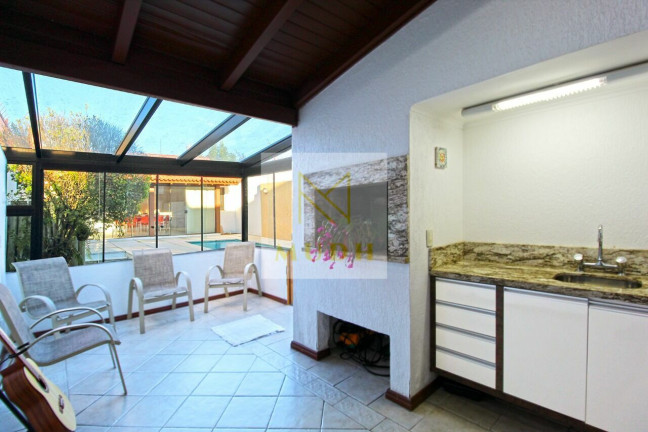 Imagem Casa com 4 Quartos à Venda, 300 m² em Ipanema - Porto Alegre Imagem Casa com 4 Quartos à Venda, 300 m² em Ipanema - Porto Alegre