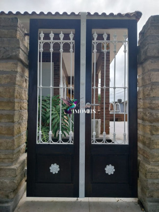 Imagem Casa com 3 Quartos à Venda, 126 m² em Centro - Torres Imagem Casa com 3 Quartos à Venda, 126 m² em Centro - Torres