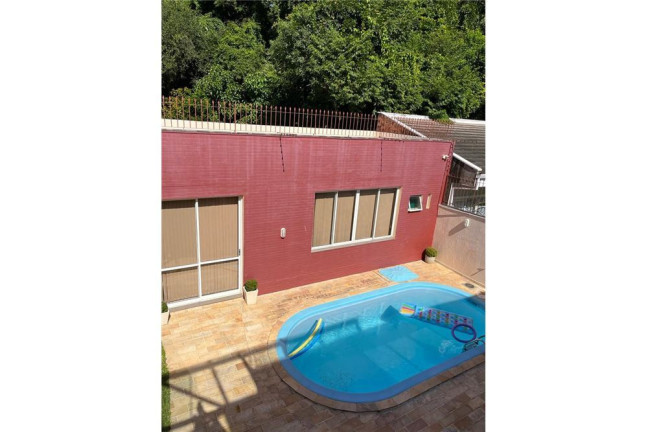 Imagem Casa com 4 Quartos à Venda, 330 m² em Nonoai - Porto Alegre Imagem Casa com 4 Quartos à Venda, 330 m² em Nonoai - Porto Alegre