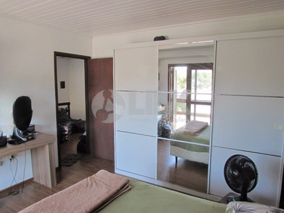 Imagem Casa com 4 Quartos à Venda, 200 m² em Jardim Carvalho - Porto Alegre Imagem Casa com 4 Quartos à Venda, 200 m² em Jardim Carvalho - Porto Alegre