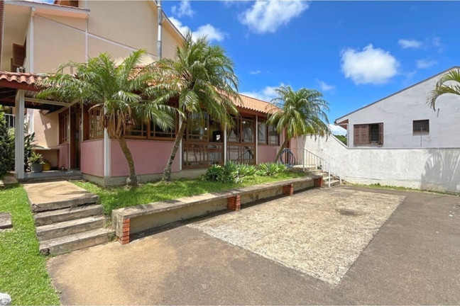 Imagem Casa com 3 Quartos à Venda, 101 m² em Espírito Santo - Porto Alegre Imagem Casa com 3 Quartos à Venda, 101 m² em Espírito Santo - Porto Alegre