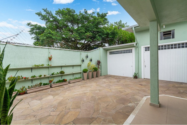 Imagem Casa com 3 Quartos à Venda, 228 m² em Niterói - Canoas Imagem Casa com 3 Quartos à Venda, 228 m² em Niterói - Canoas