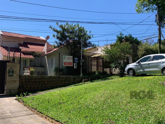 Imagem Casa com 4 Quartos à Venda,  em Santa Tereza - Porto Alegre
