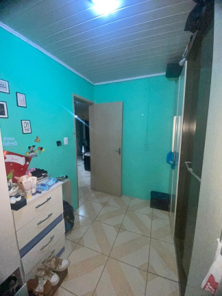 Imagem Casa com 2 Quartos à Venda, em Costa E Silva - Porto Alegre Imagem Casa com 2 Quartos à Venda, em Costa E Silva - Porto Alegre