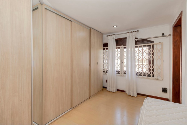 Imagem Casa com 8 Quartos à Venda, 430 m² em Partenon - Porto Alegre Imagem Casa com 8 Quartos à Venda, 430 m² em Partenon - Porto Alegre