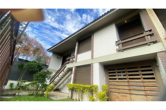 Imagem Casa com 5 Quartos à Venda,  em Higienópolis - Porto Alegre