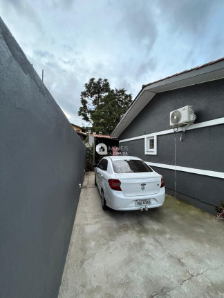 Imagem Casa com 4 Quartos à Venda, 110 m²
