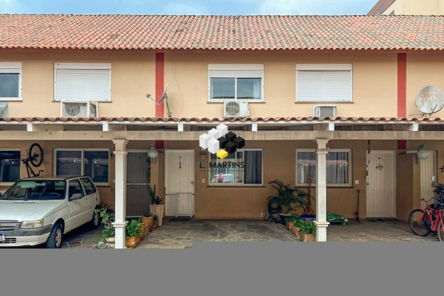 Imagem Casa de Condomínio com 2 Quartos à Venda, 103 m² em Rio Branco - Canoas Imagem Casa de Condomínio com 2 Quartos à Venda, 103 m² em Rio Branco - Canoas