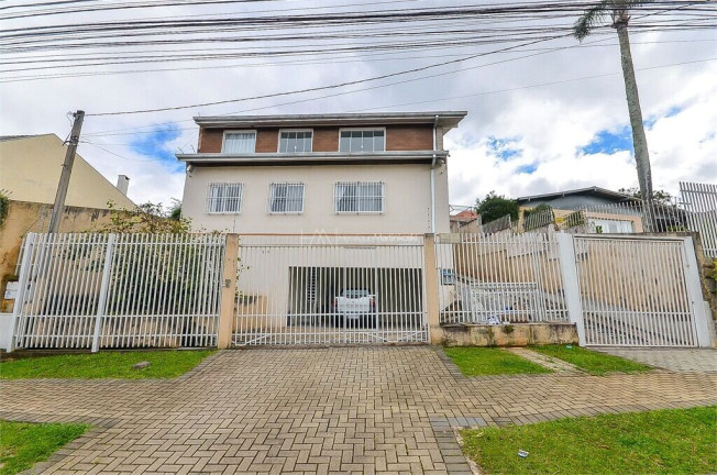Imagem Casa com 4 Quartos à Venda, 307 m² em São Lourenço - Curitiba
