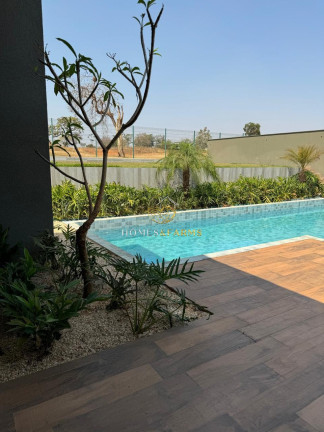 Imagem Casa com 4 Quartos à Venda, 480 m² em Loteamento Portal Do Sol I - Goiânia
