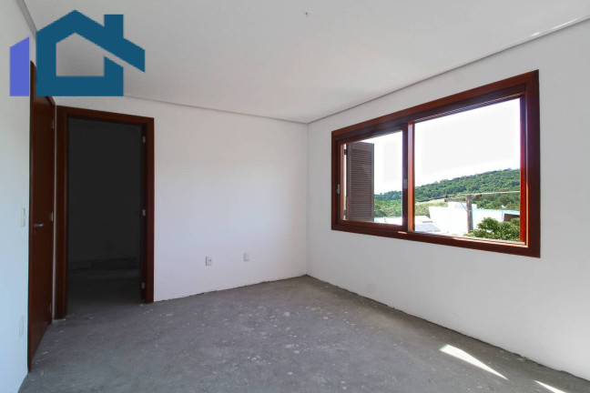 Imagem Sobrado com 3 Quartos à Venda, 224 m² em Vila Nova - Porto Alegre
