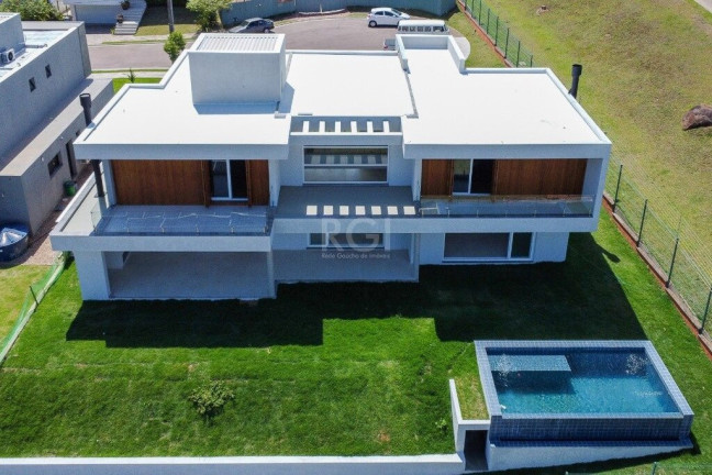 Imagem Casa com 4 Quartos à Venda, em Vila Nova - Porto Alegre Imagem Casa com 4 Quartos à Venda, em Vila Nova - Porto Alegre