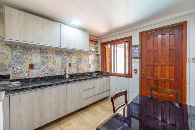 Imagem Casa com 4 Quartos à Venda, 165 m² em Igara - Canoas Imagem Casa com 4 Quartos à Venda, 165 m² em Igara - Canoas