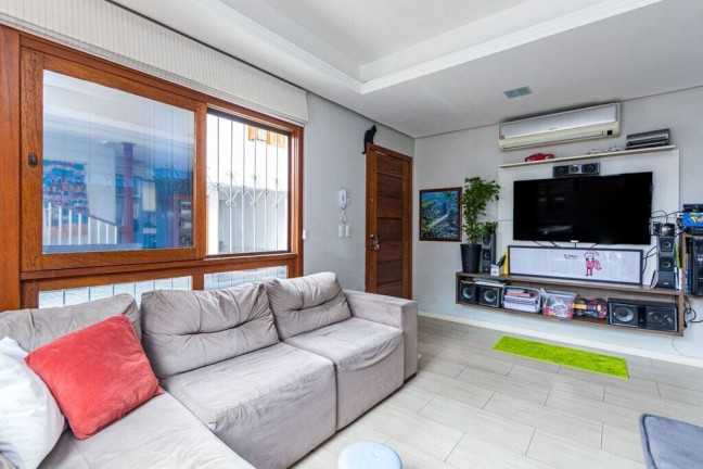 Imagem Casa de Condomínio com 3 Quartos à Venda, 168 m² em Santo Antônio - Porto Alegre Imagem Casa de Condomínio com 3 Quartos à Venda, 168 m² em Santo Antônio - Porto Alegre