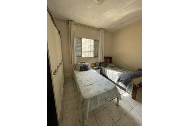 Imagem Casa com 2 Quartos à Venda, 137 m² em  Cidade Continental  -  São Paulo 