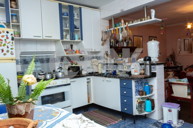 Imagem Casa com 5 Quartos à Venda, 251 m² em Santa Maria Goretti - Porto Alegre Imagem Casa com 5 Quartos à Venda, 251 m² em Santa Maria Goretti - Porto Alegre