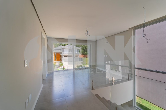 Imagem Imóvel com 3 Quartos à Venda, 300 m² em Vila Nova - Porto Alegre