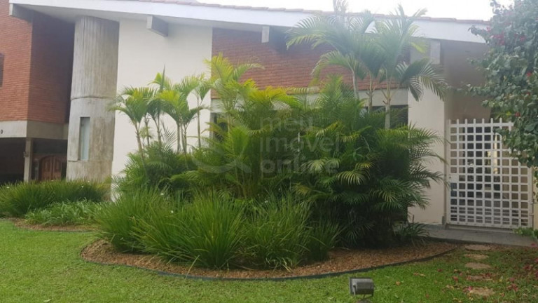 Imagem Casa de Condomínio com 4 Quartos à Venda, 470 m²