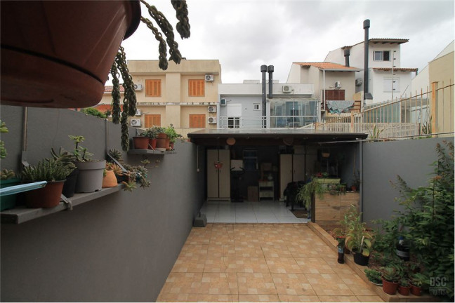 Imagem Casa com 3 Quartos à Venda, em Guarujá - Porto Alegre Imagem Casa com 3 Quartos à Venda, em Guarujá - Porto Alegre