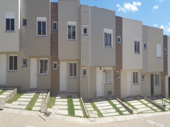 Imagem Casa com 3 Quartos à Venda, 75 m² em Vila Nova - Porto Alegre Imagem Casa com 3 Quartos à Venda, 75 m² em Vila Nova - Porto Alegre