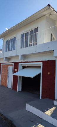 Imagem Casa com 3 Quartos à Venda, 310 m² em Vila Nova - Porto Alegre Imagem Casa com 3 Quartos à Venda, 310 m² em Vila Nova - Porto Alegre