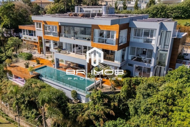 Imagem Casa com 6 Quartos à Venda, 1.093 m² em Cacupé - Florianópolis Imagem Casa com 6 Quartos à Venda, 1.093 m² em Cacupé - Florianópolis