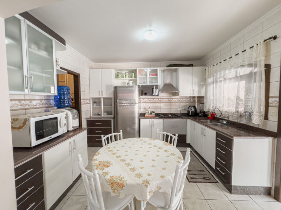 Imagem Casa com 4 Quartos à Venda, 344 m² em Campo Comprido - Curitiba
