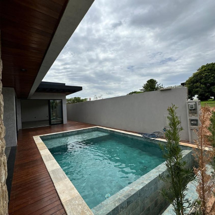 Imagem Casa de Condomínio com 4 Quartos à Venda, 240 m² em Centro - Rifaina