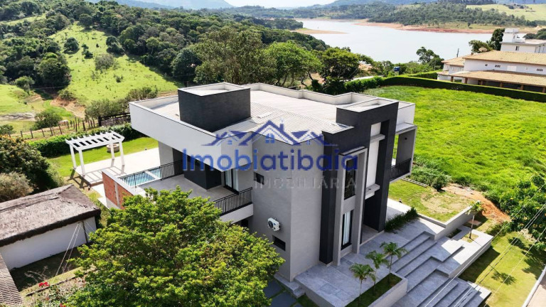 Imagem Casa de Condomínio com 4 Quartos à Venda, 1.039 m² em Lopo - Vargem
