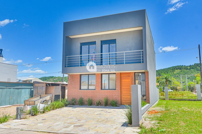 Imagem Casa com 3 Quartos à Venda, 165 m²