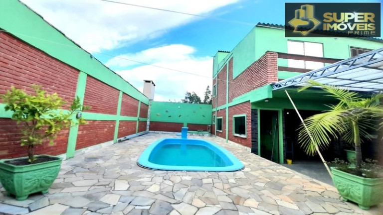 Imagem Casa com 4 Quartos à Venda, 432 m² em Laranjal - Pelotas