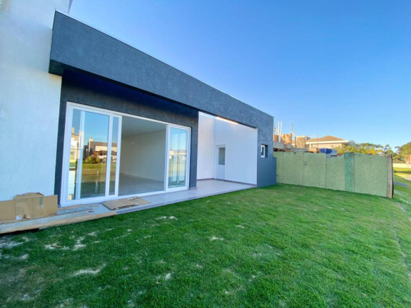 Imagem Casa com 4 Quartos à Venda, 183 m² em Capão Da Canoa - Capao Da Canoa