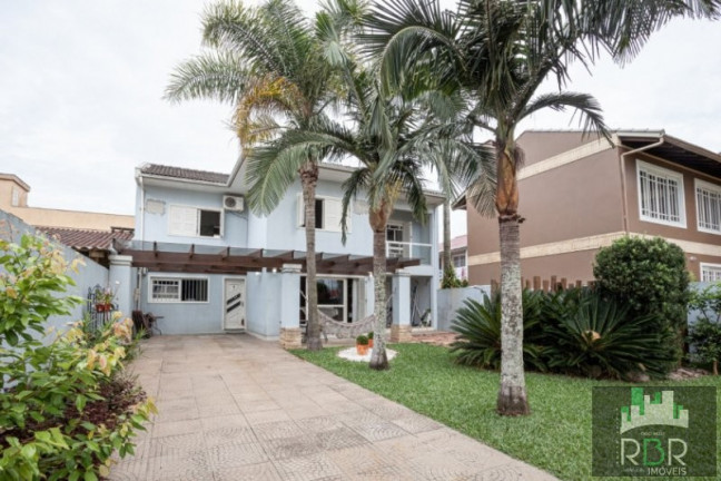 Imagem Casa com 4 Quartos à Venda, 223 m² em Torres Imagem Casa com 4 Quartos à Venda, 223 m² em Torres