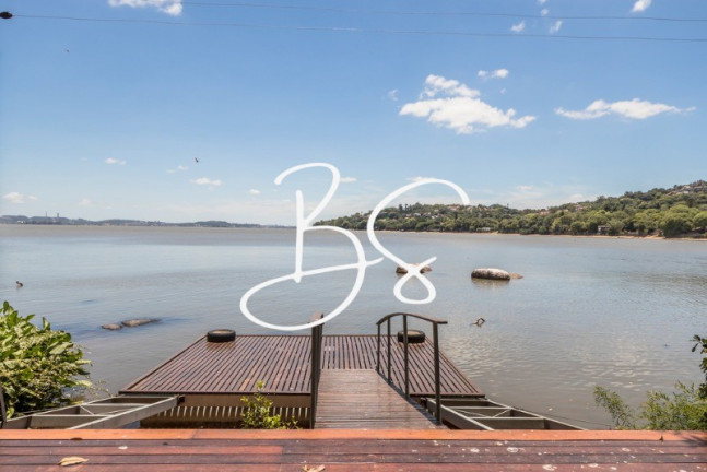 Imagem Casa com 4 Quartos à Venda, 470 m² em Pedra Redonda - Porto Alegre Imagem Casa com 4 Quartos à Venda, 470 m² em Pedra Redonda - Porto Alegre