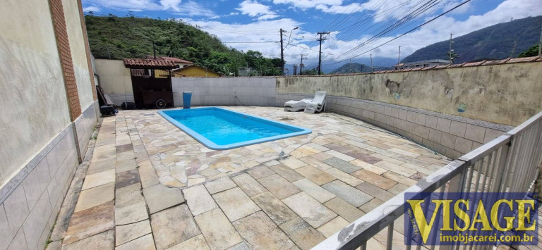 Imagem Casa de Condomínio com 3 Quartos à Venda, 101 m² em Prainha - Caraguatatuba