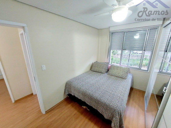Imagem Imóvel com 3 Quartos à Venda, 62 m² em Vila Nova - Porto Alegre Imagem Imóvel com 3 Quartos à Venda, 62 m² em Vila Nova - Porto Alegre