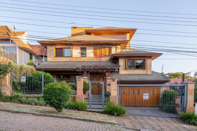 Imagem Casa com 4 Quartos à Venda, 498 m² em Ipanema - Porto Alegre Imagem Casa com 4 Quartos à Venda, 498 m² em Ipanema - Porto Alegre