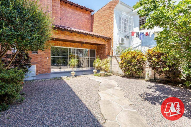 Imagem Casa com 5 Quartos à Venda, 337 m² em Rio Branco - Porto Alegre Imagem Casa com 5 Quartos à Venda, 337 m² em Rio Branco - Porto Alegre