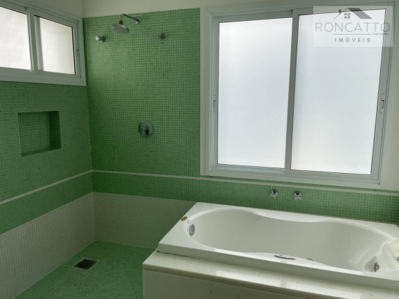 Imagem Casa de Condomínio com 4 Quartos à Venda, 240 m²