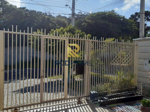 Imagem Casa com 4 Quartos à Venda, 199 m² em Uberaba - Curitiba