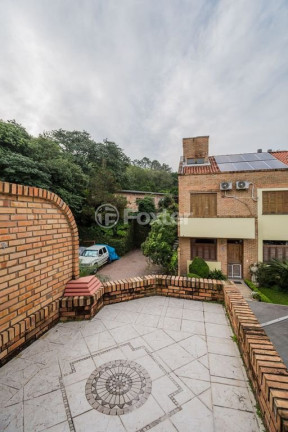 Imagem Casa com 3 Quartos à Venda, 142 m² em Cavalhada - Porto Alegre