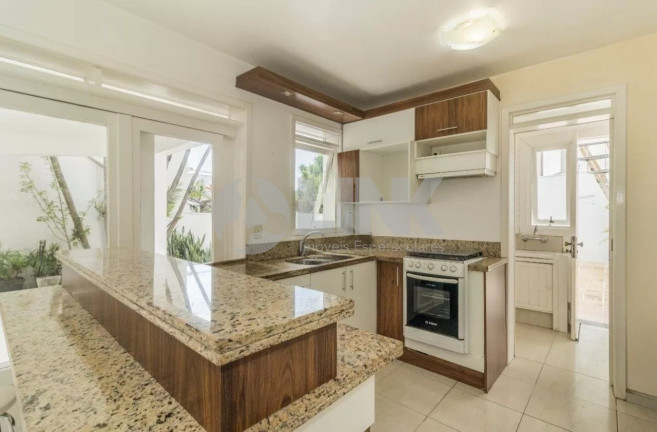 Imagem Casa com 4 Quartos à Venda, 250 m² em Menino Deus - Porto Alegre
