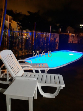 Imagem Casa com 4 Quartos à Venda, 450 m² em Canasvieiras - Florianópolis