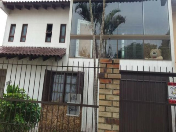 Imagem Casa com 3 Quartos à Venda, 200 m² em Parque Santa Fé - Porto Alegre Imagem Casa com 3 Quartos à Venda, 200 m² em Parque Santa Fé - Porto Alegre