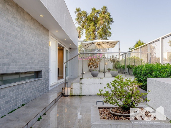 Imagem Casa com 3 Quartos à Venda, 400 m² em Três Figueiras - Porto Alegre Imagem Casa com 3 Quartos à Venda, 400 m² em Três Figueiras - Porto Alegre