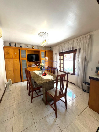 Imagem Casa com 3 Quartos à Venda, 244 m² em Cavalhada - Porto Alegre Imagem Casa com 3 Quartos à Venda, 244 m² em Cavalhada - Porto Alegre