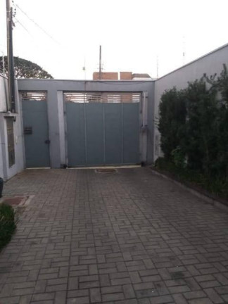 Imagem Casa de Condomínio com 4 Quartos à Venda, 180 m²