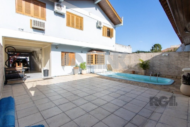 Imagem Casa com 5 Quartos à Venda, 336 m² em Glória - Porto Alegre Imagem Casa com 5 Quartos à Venda, 336 m² em Glória - Porto Alegre