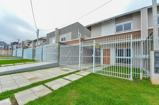 Imagem Casa com 4 Quartos à Venda, 184 m² em Xaxim - Curitiba